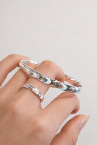 <tc>Armband Katzenauge – Eine Welle in Bewegung</tc>